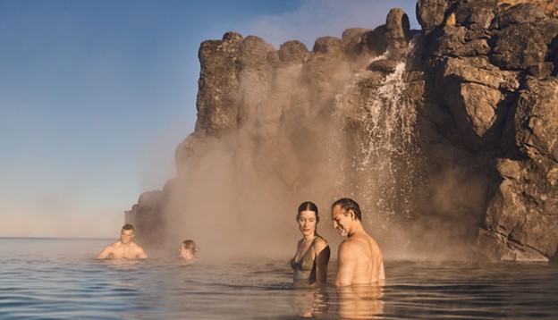 Guests enjoying the Sky Lagoon geothermal experience